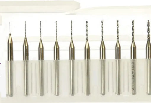 Close-up of imported tungsten carbide micro-engraving bits in various sizes from 0.10mm to 2.00mm diameter.