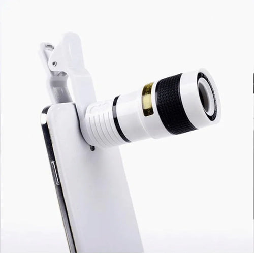 Black 12x mobile phone telescope lens with clip extended next to smartphone