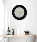 Minimalist transparent tempered glass wall clock, 29.5cm diameter, with silent movement on a plain wall.