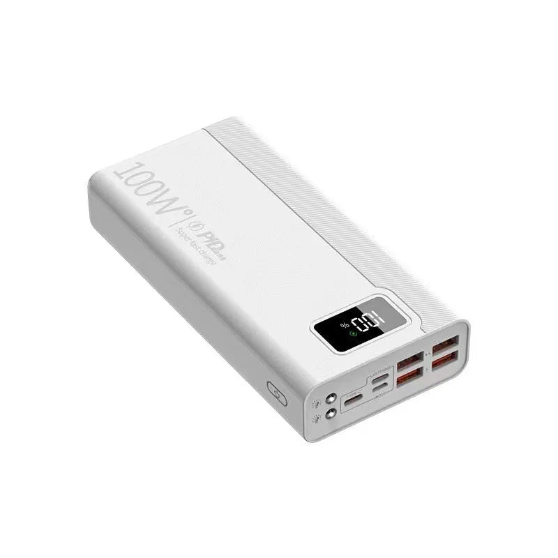 Black and white large capacity power bank with fast charging support, showing size scale.