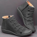 Women's casual flat ankle boots with wedge heel and round toe in leopard print colour.