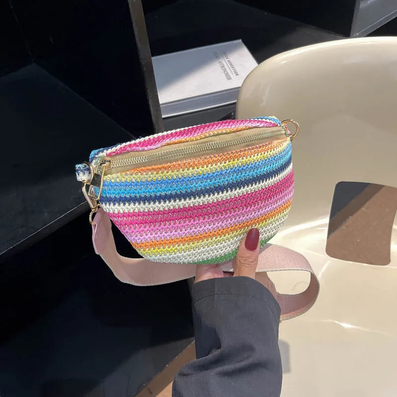 Women's pink and blue bohemian straw beach bag with shell shape and shoulder strap