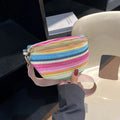 Women's pink and blue bohemian straw beach bag with shell shape and shoulder strap