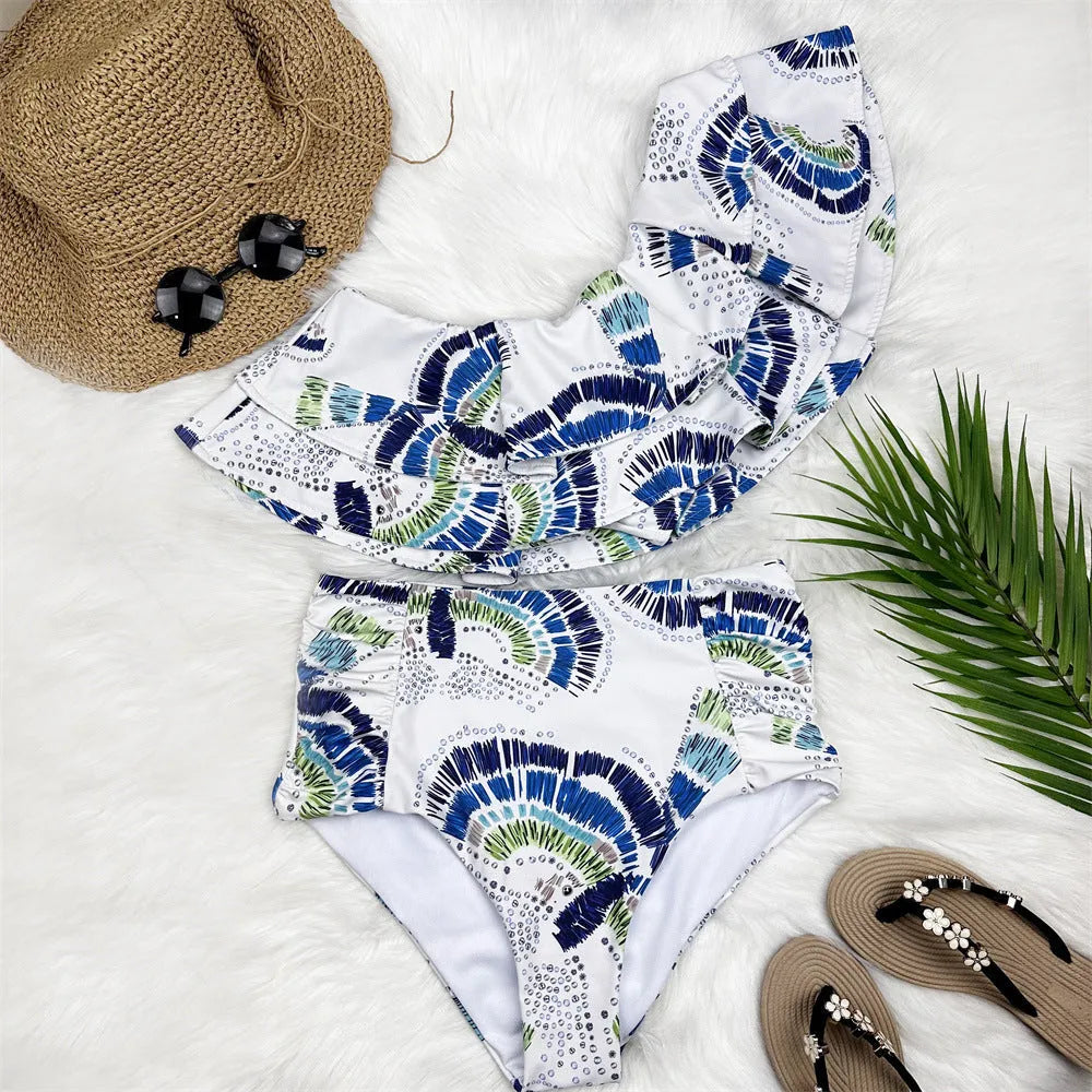 White one-shoulder women's swimsuit with lotus leaf decoration and high-leg split