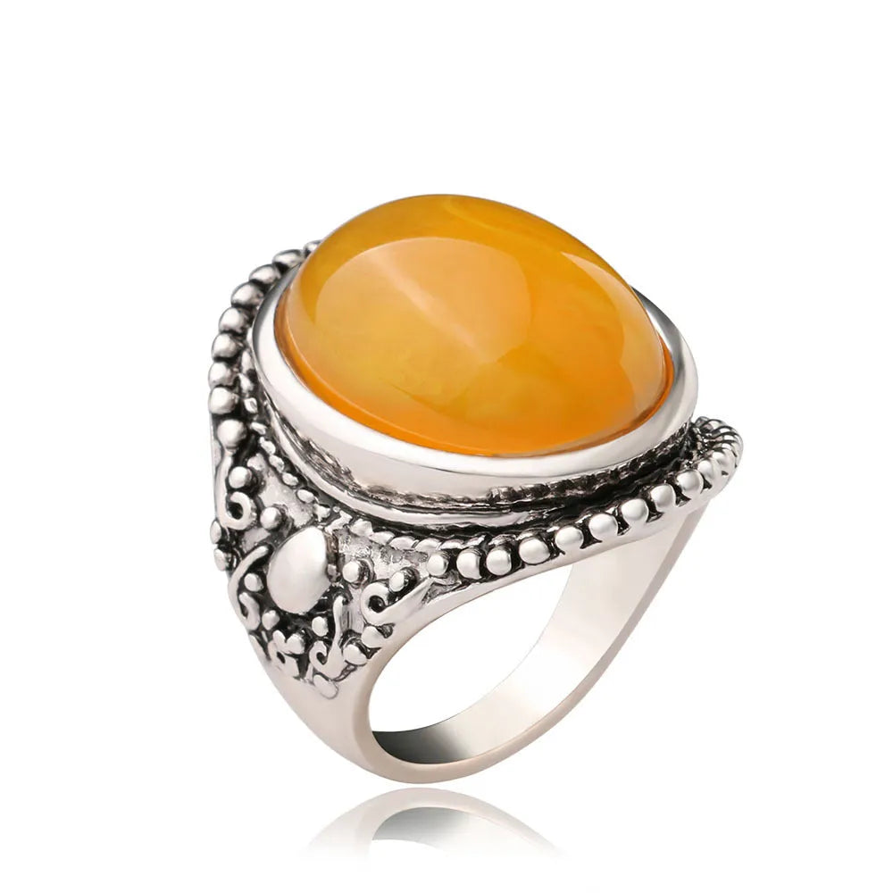 Geometric retro alloy ring with fluorescent beeswax centrepiece in antique silver Amber colour