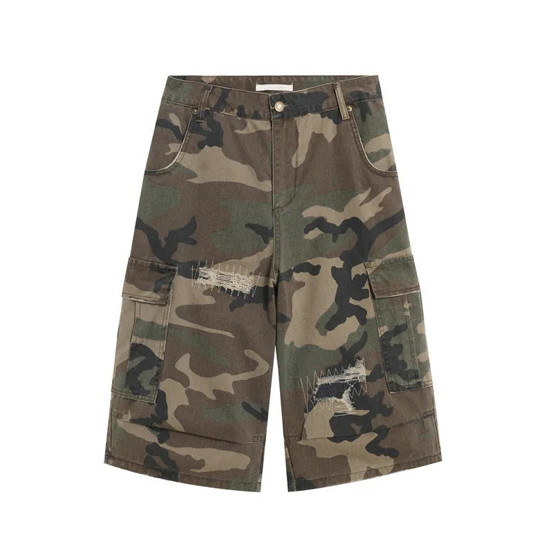 Men's camouflage cropped jeans with retro patches and ripped detailing on straight leg trousers