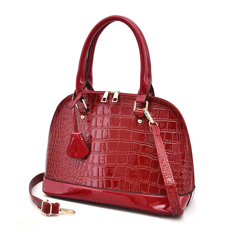 Shiny PU leather crossbody shoulder bag in shell shape with 22x30x15cm dimensions