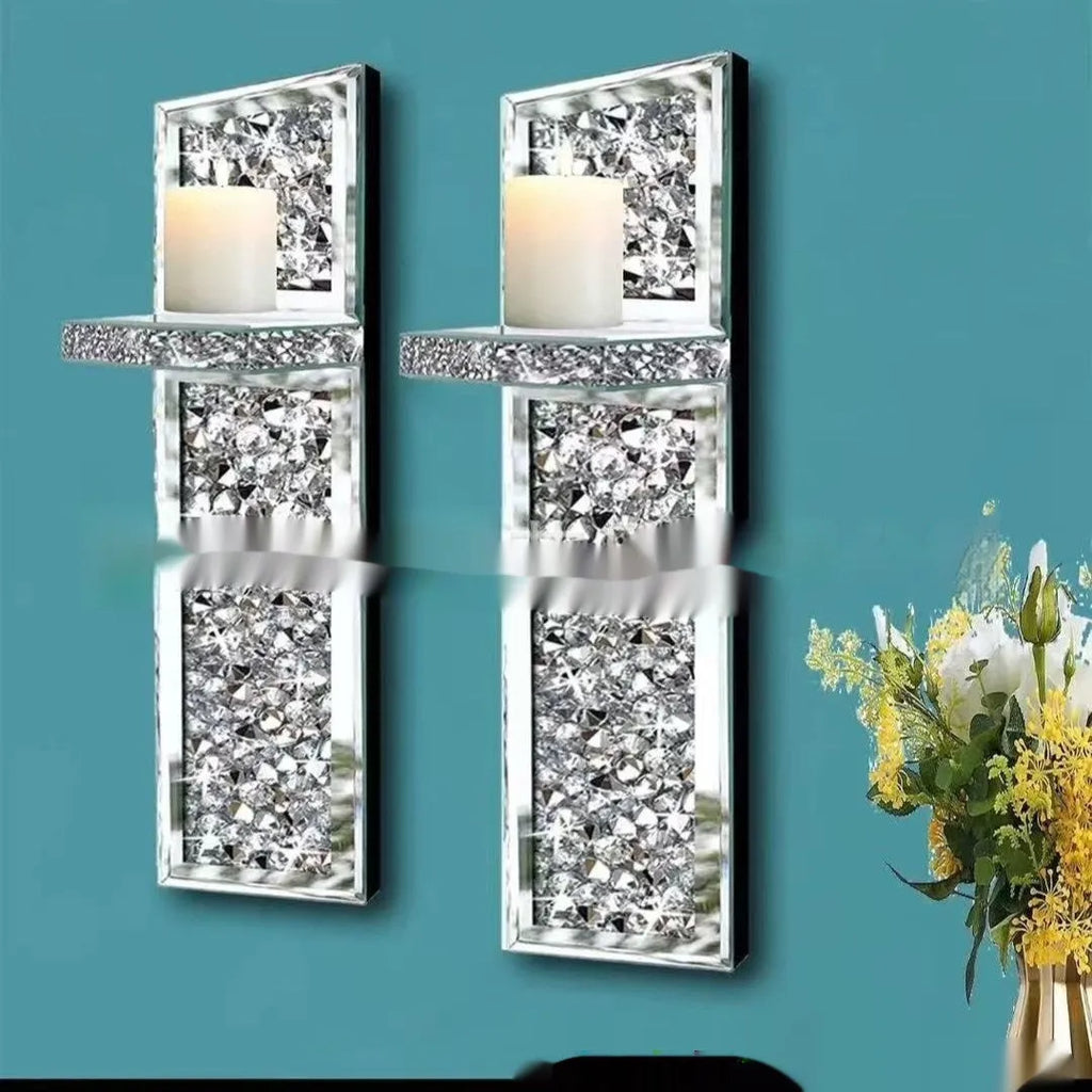 Pair of tall silver mirror glass wall-hanging candle holders with modern crystal design.