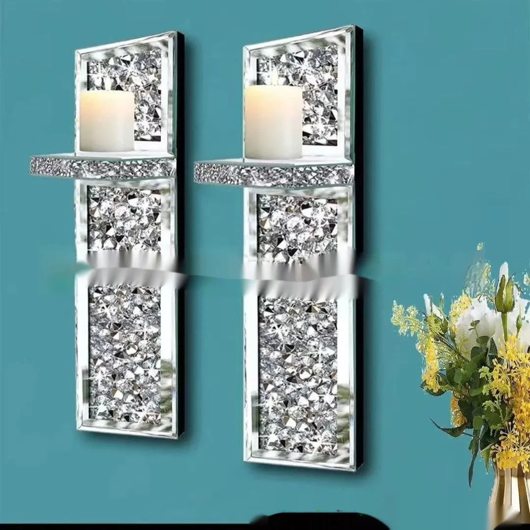 Pair of tall silver mirror glass wall-hanging candle holders with modern crystal design.