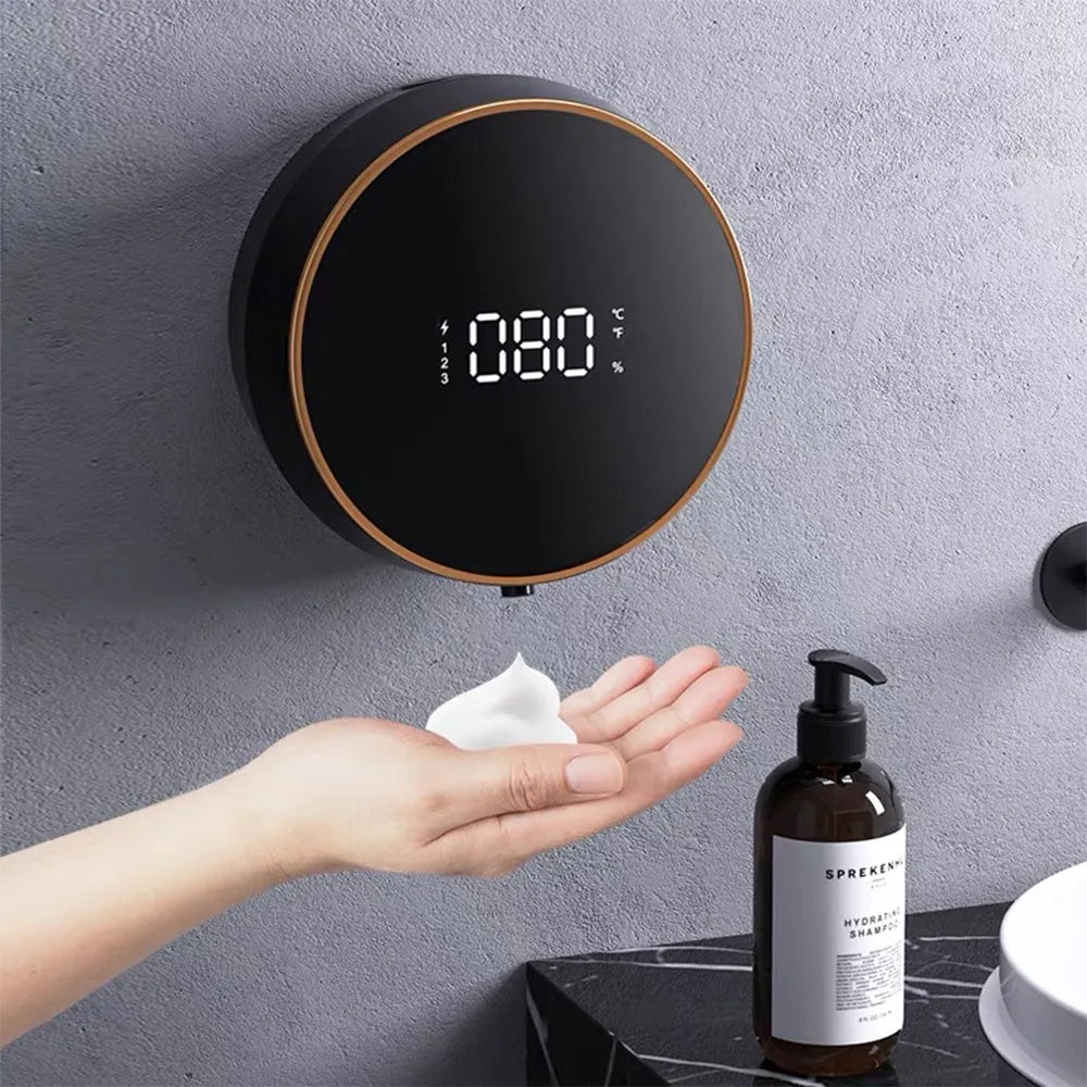 Black wall-mounted automatic foam soap dispenser with a USB charging port.