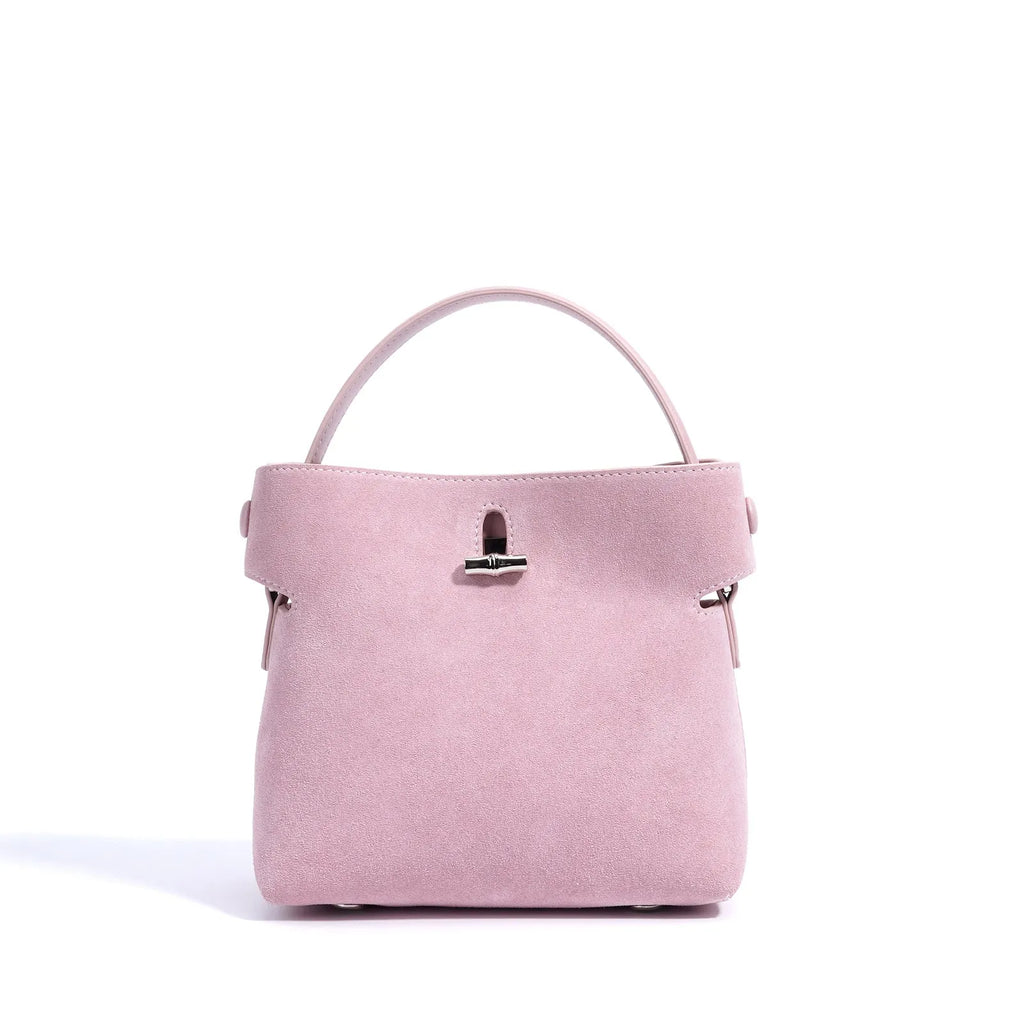 Women's mini messenger bag in matte cowhide with lock closure and bucket shape