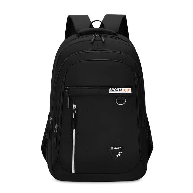 Men's large black Oxford cloth schoolbag with air pillow shoulder straps and splicing design detail.