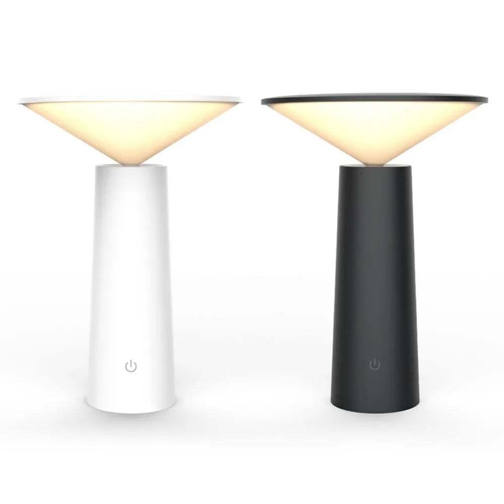Black USB rechargeable table lamp with touch sensor and adjustable LED reading light head on a desk.