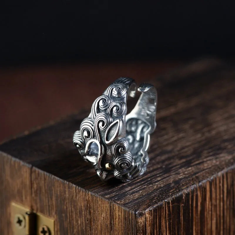 Silver open-style ring with a domineering engraved zodiac animal Jibeast pattern.
