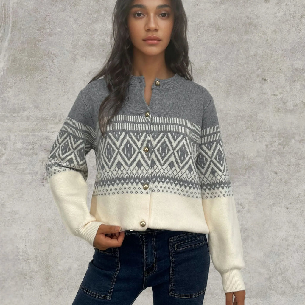 Grey alpaca wool women's cardigan with pink diamond knit contrast sleeves.