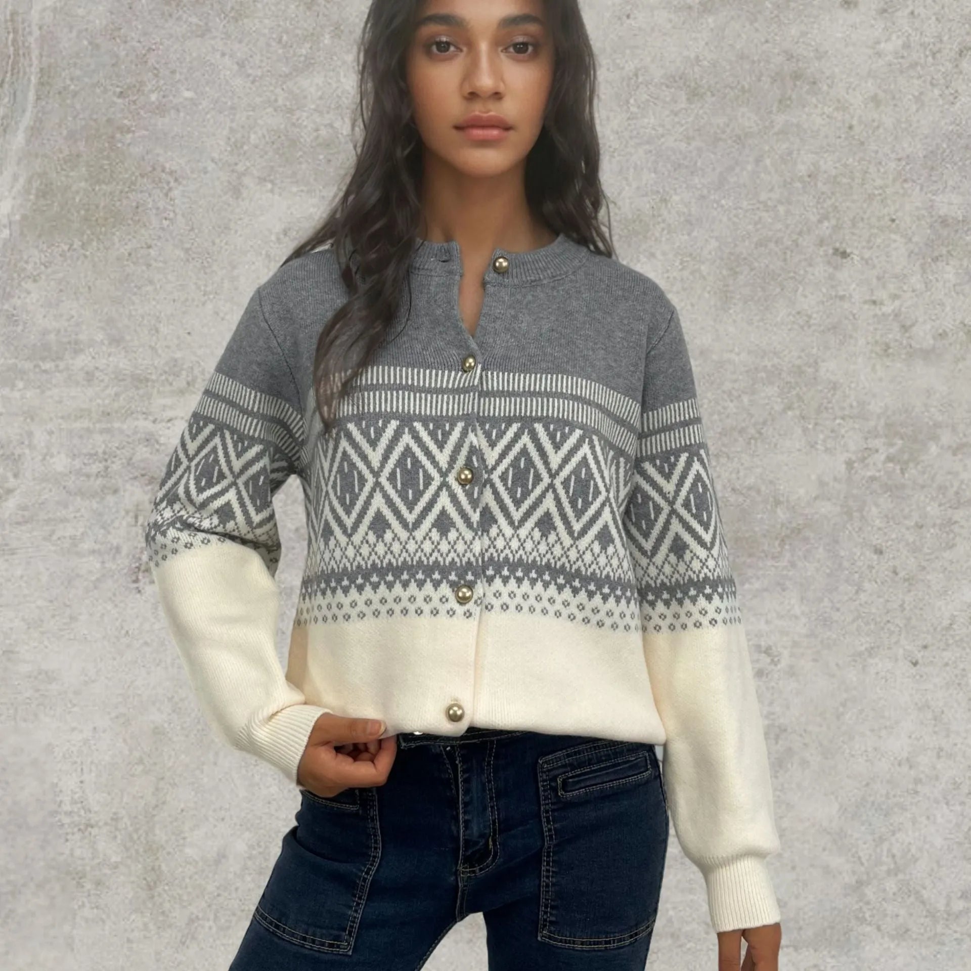 Grey alpaca wool women's cardigan with pink diamond knit contrast sleeves.