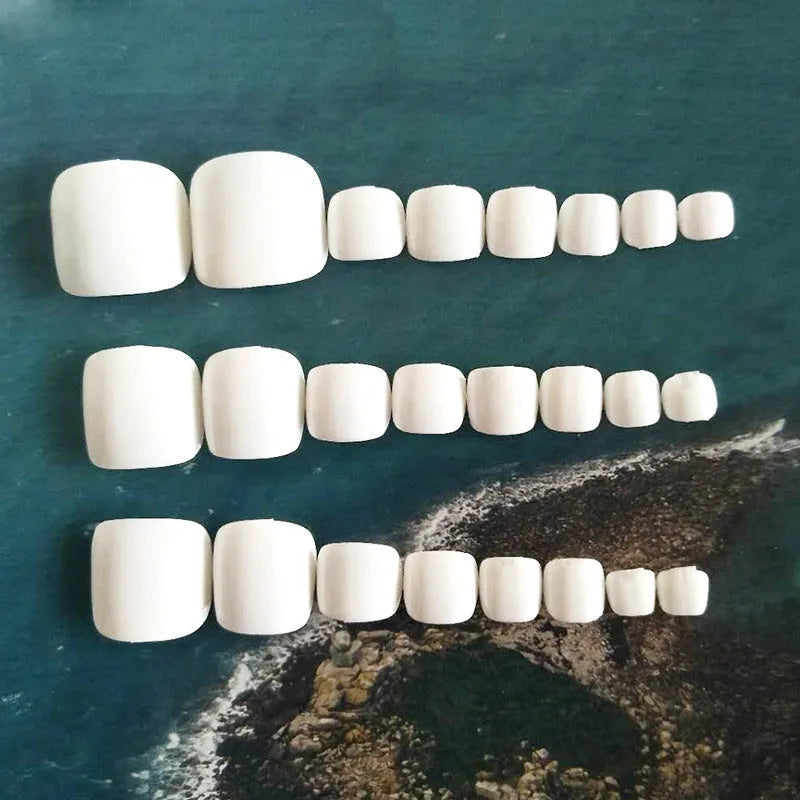 Starry Sky pattern press-on artificial nails with short square shape and white glue adhesive