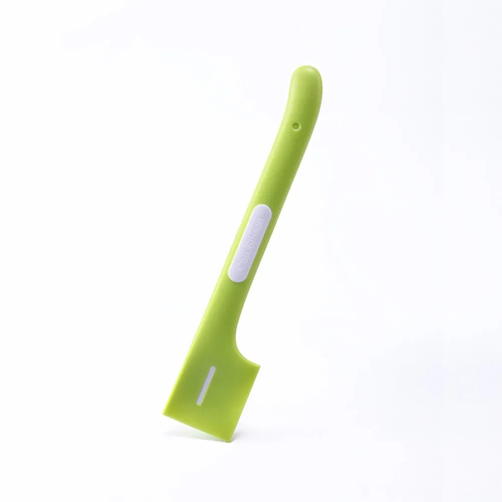 Long green pet feeding spoon with right-angle head for scooping canned dog or cat food