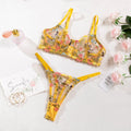 Floral pattern mesh bra with steel ring T-back and matching underwear in skin colour