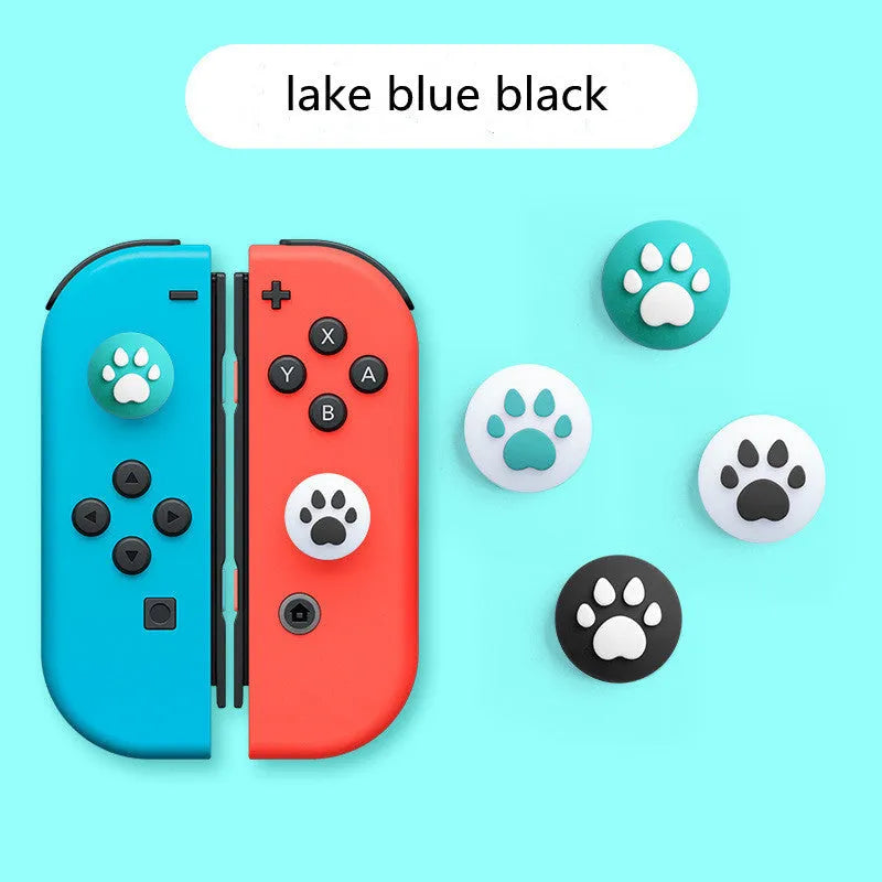 Set of four silicone cat claw grip covers for Nintendo Switch Lite joysticks in assorted colours.