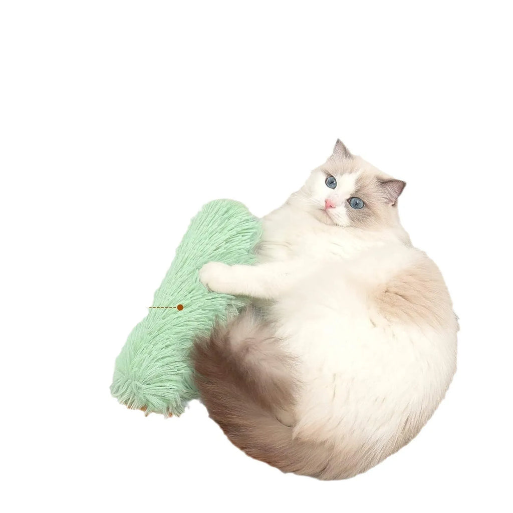 Plush cat toy pillow in blue, green, pink, or white colours, measuring 27cm by 10cm.