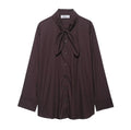 Brown women's poplin shirt with a loose fit, long sleeves, and a self-tie bow scarf collar.