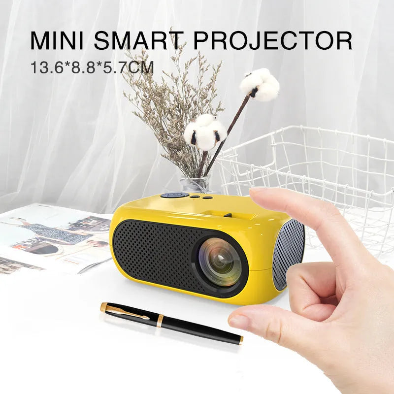 M24 portable mini projector in gold colour showing compact dimensions and included accessories