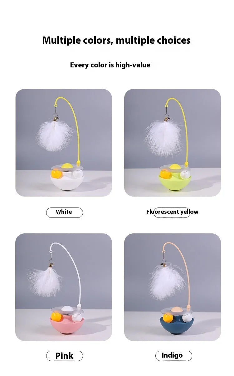 Cat interactive tumbler toy with feather wand and catnip ball on floor for kitten exercise