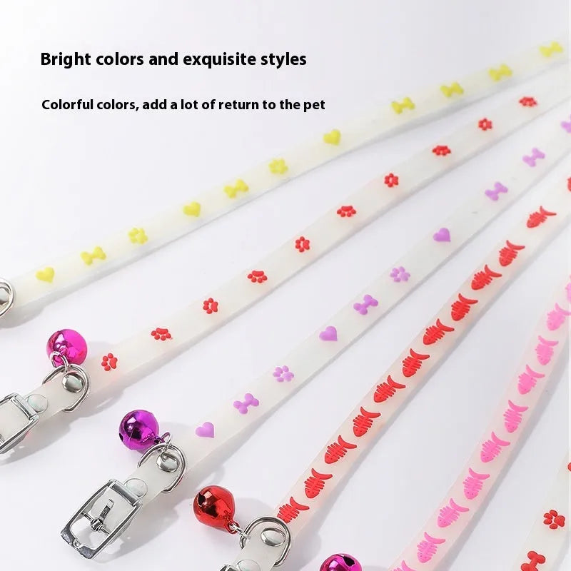 Luminous cat collar with adjustable silicone chain and metal bell in paw print design