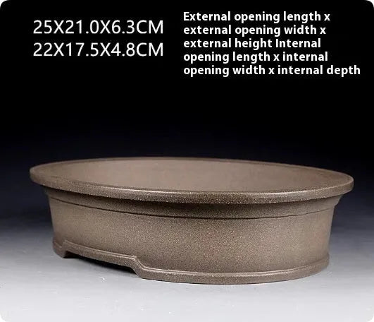 Handmade antique oval bonsai pot in purple sand clay measuring 25x21x6.3cm