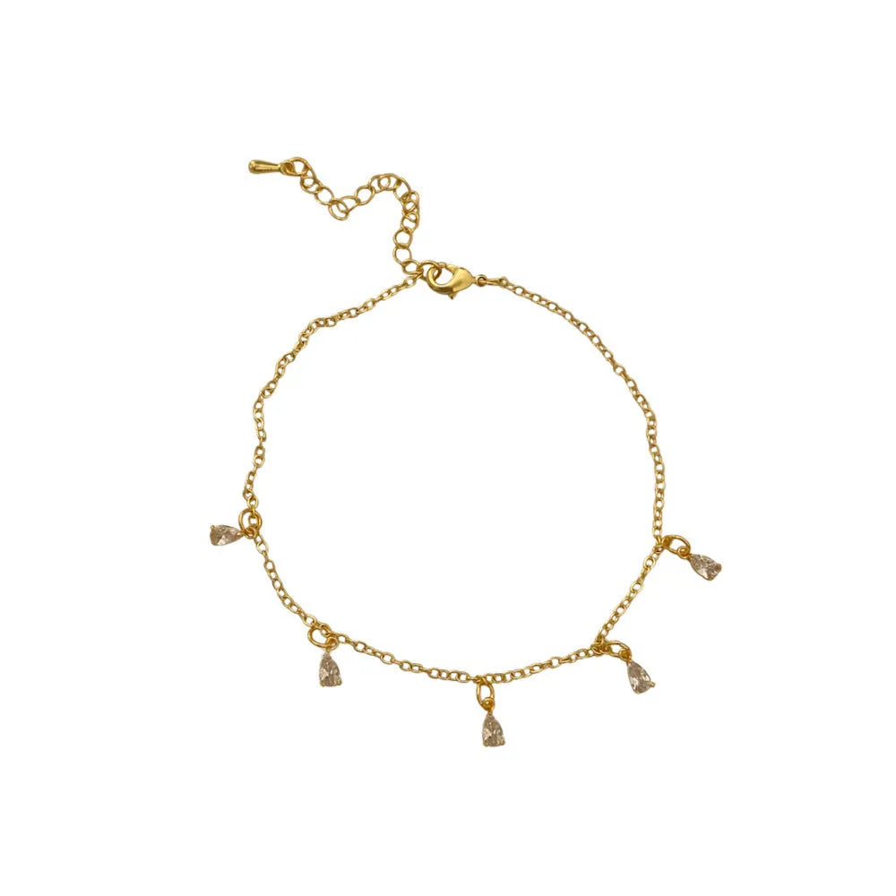 Women's zircon necklace, earrings, and anklet set with geometric pendant.