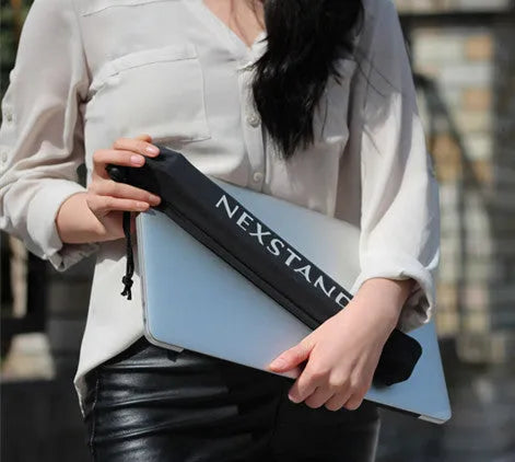 Black folding laptop stand with 360° rotating base shown in open and closed positions