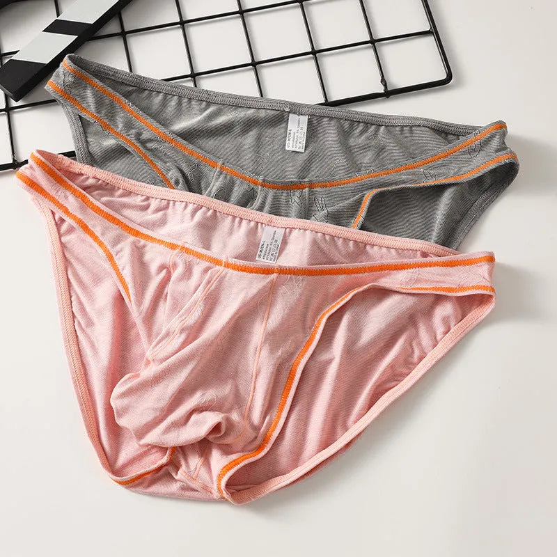 Men's modal butt-lift underwear in colourful blue, showing contoured hip design