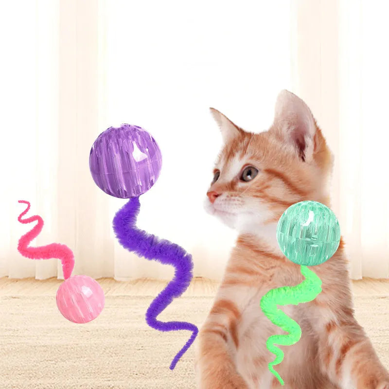 Interactive cat ball toy with flexible plush tail attached to bouncy TPR ball