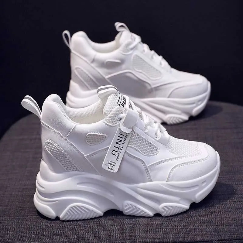 Women's black mesh platform casual shoes with hollow-out design and toe holder on a white background