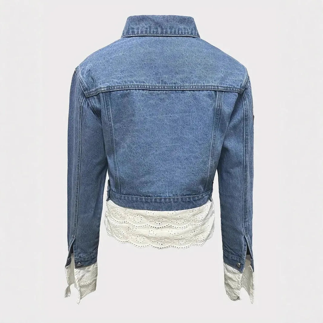 Blue women's denim jacket with lace stitching detail on the front, with long sleeves.