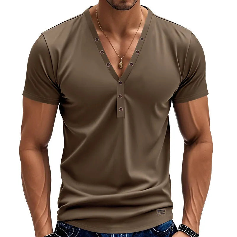 Man wearing a loose fit light blue V-neck button-up sport shirt