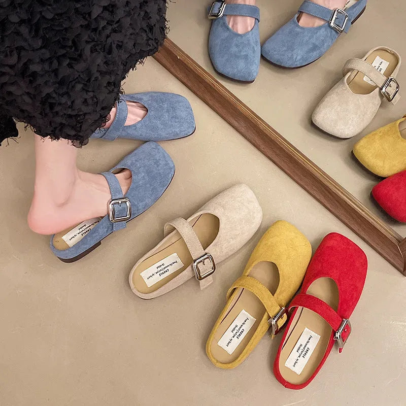 Women's flat square head slippers in apricot colour, showing closed toe and rubber sole.