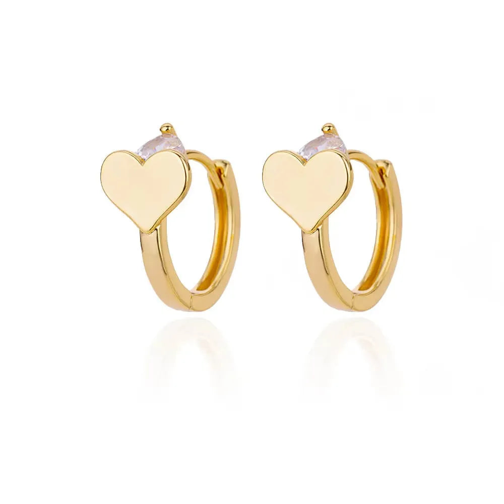 Pink heart-shaped zircon ear clip earrings for women made from stainless steel.