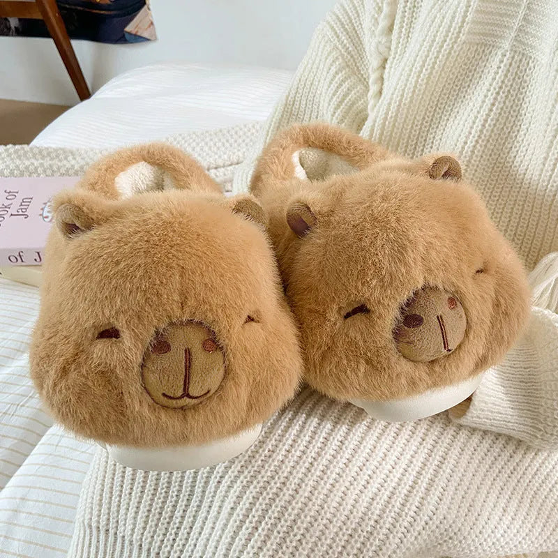 Light brown women's winter slippers with plush upper and cartoon pattern