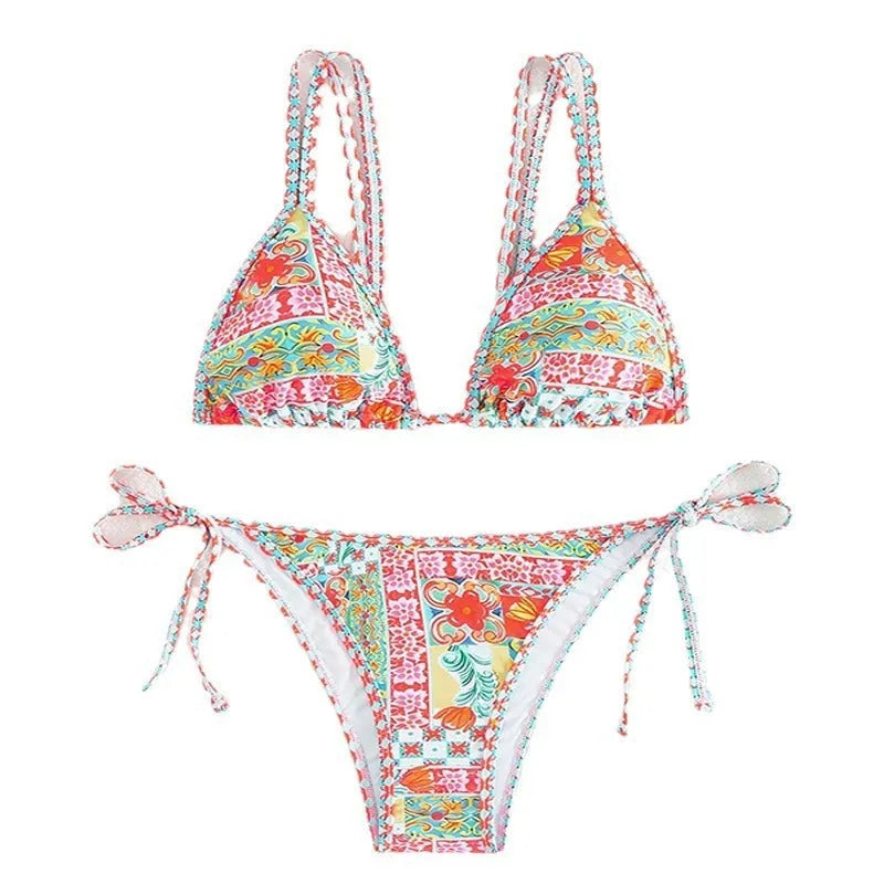 Women's lace-up front split-leg swimsuit in picture colour with brief style bottoms