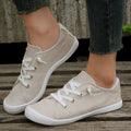 Women's creamy white low-top fabric casual sneaker on a wear-resistant rubber sole