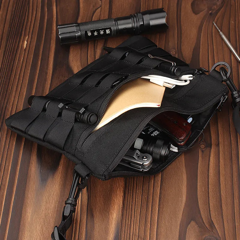 Black Oxford cloth military-style outdoor tactical bag, compact size.