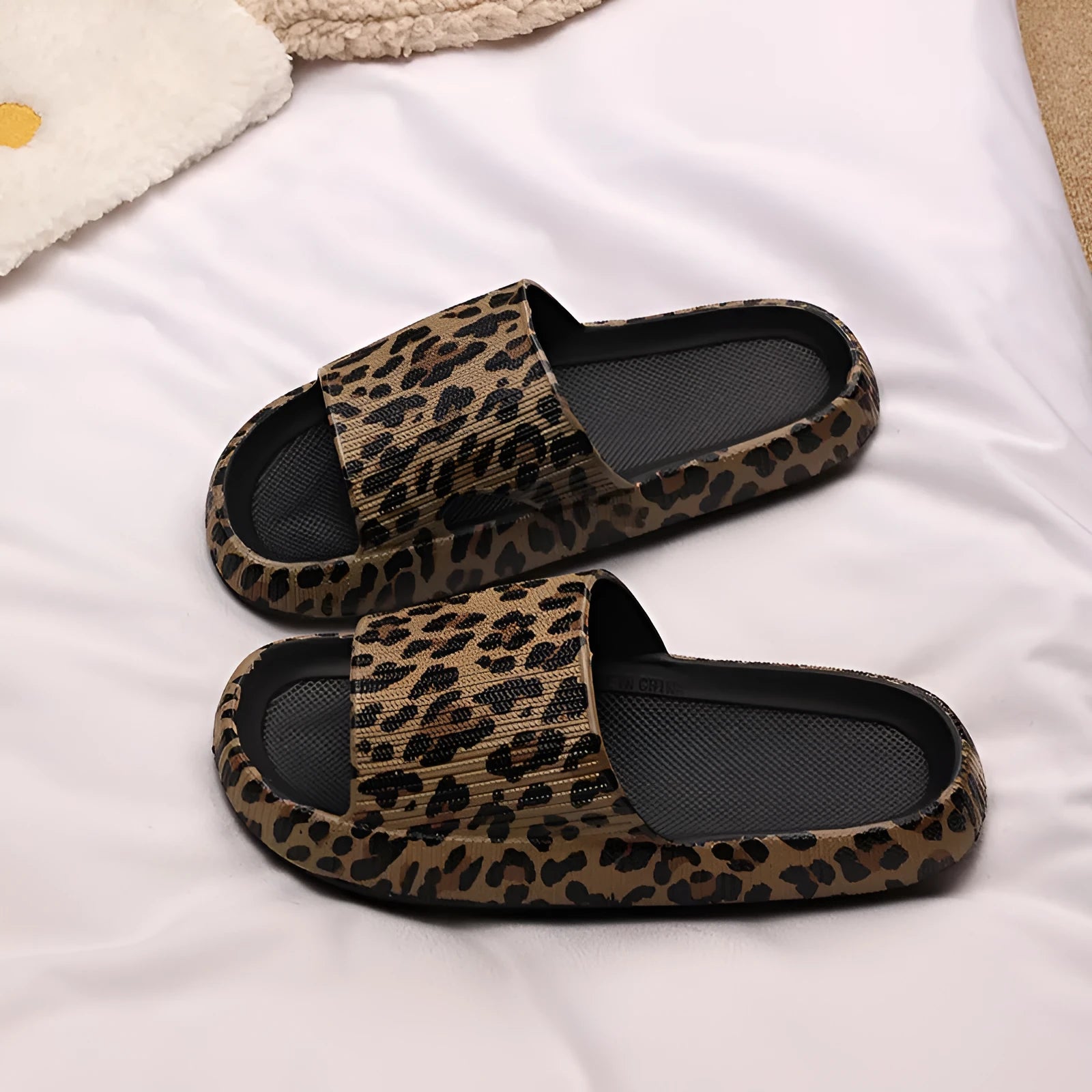 Women's leopard print EVA slippers with thick sole showing multiple colour pattern options