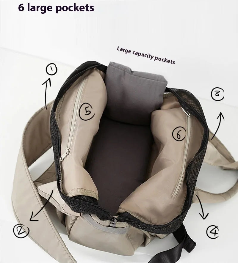 Apricot colour cloth pet carrier handbag with breathable mesh for a cat or small dog.