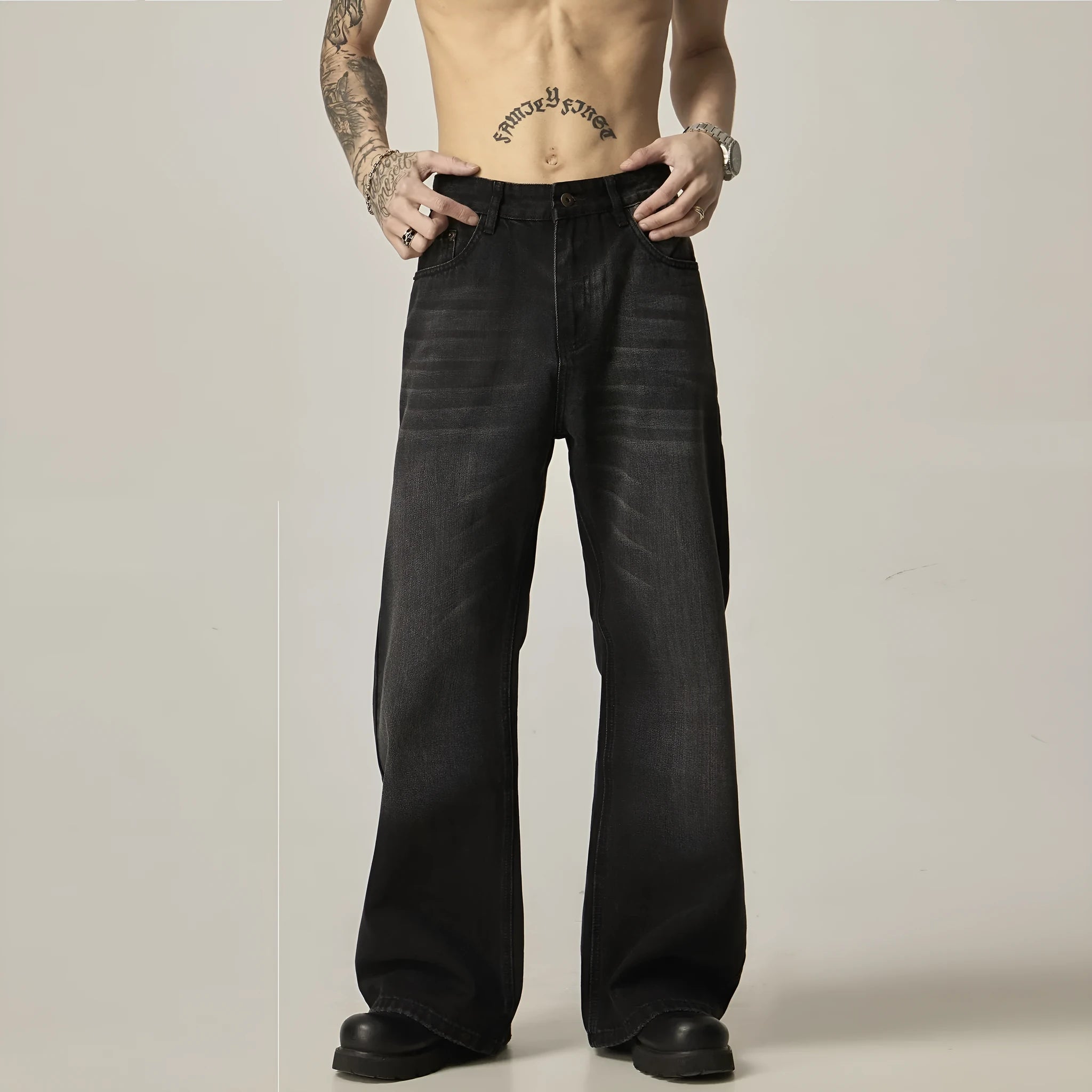 Black loose straight-leg retro jeans with zipper fly on mannequin