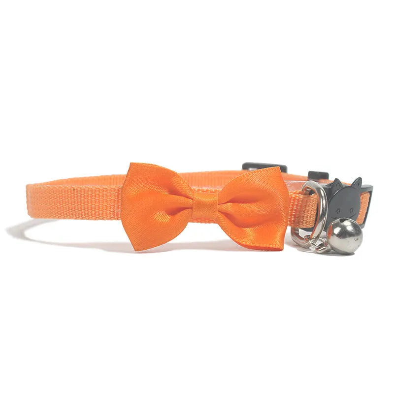 Adjustable nylon cat collar with bell in striped pattern available in multiple colours like red blue and green