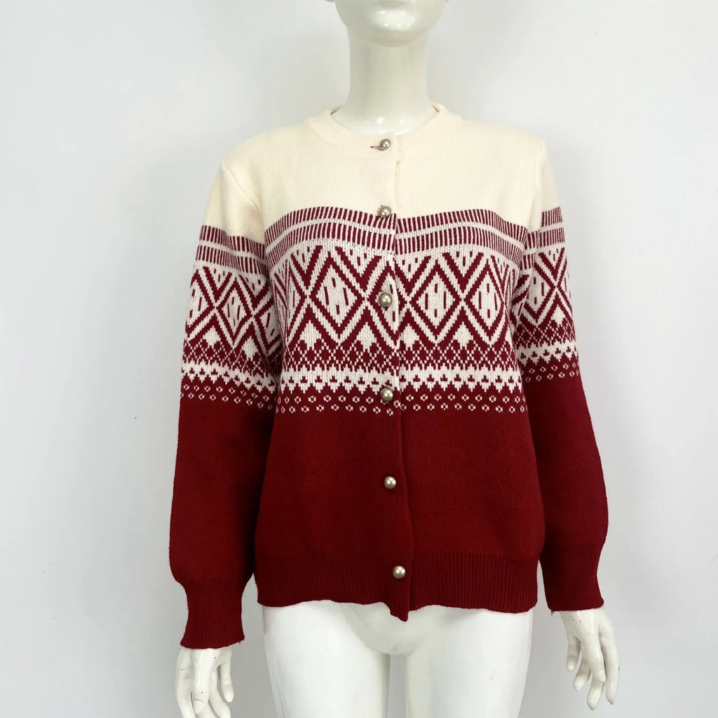 Grey alpaca wool women's cardigan with pink diamond knit contrast sleeves.