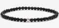 Unisex geometric bracelet with obsidian, blue San, and black agate beads.