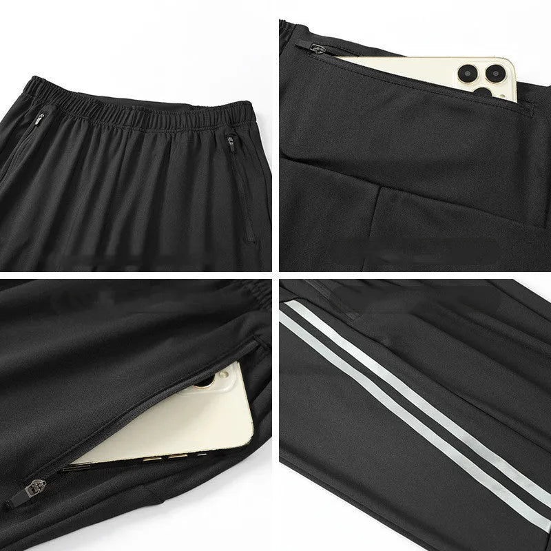 Men's black polyester running trousers with mid waist and full leg length for exercise.